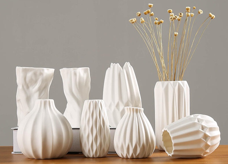 Handmade ceramic vase with floral patterns